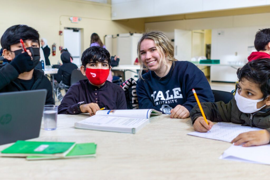 Iris-teaching-immigrants-after-school