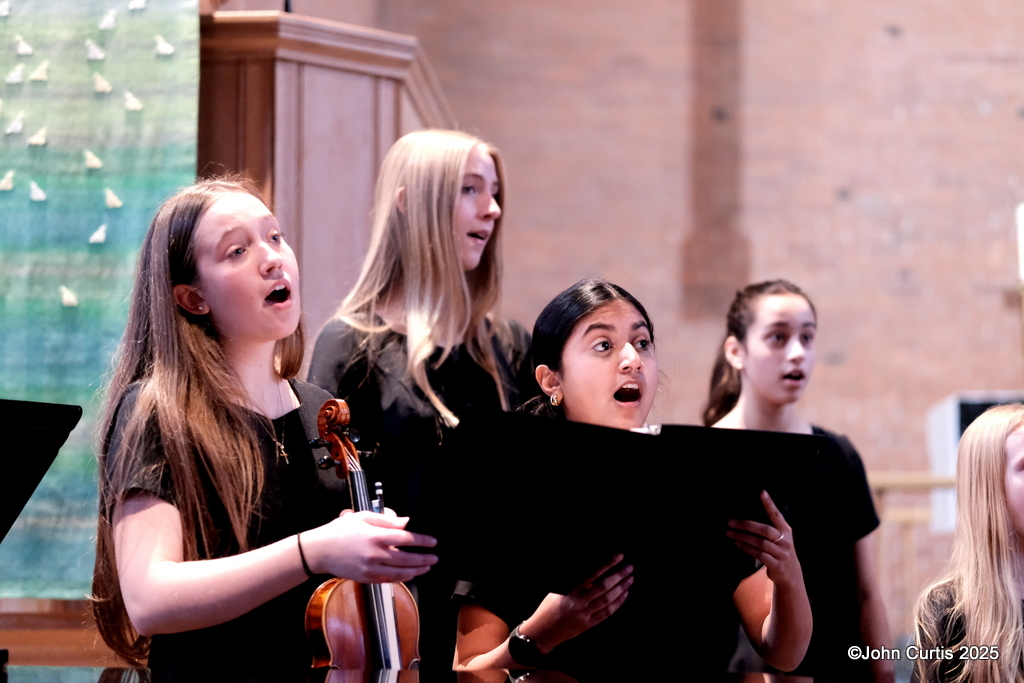 Elm City Girls Choir - sing for immigrants and IRIS