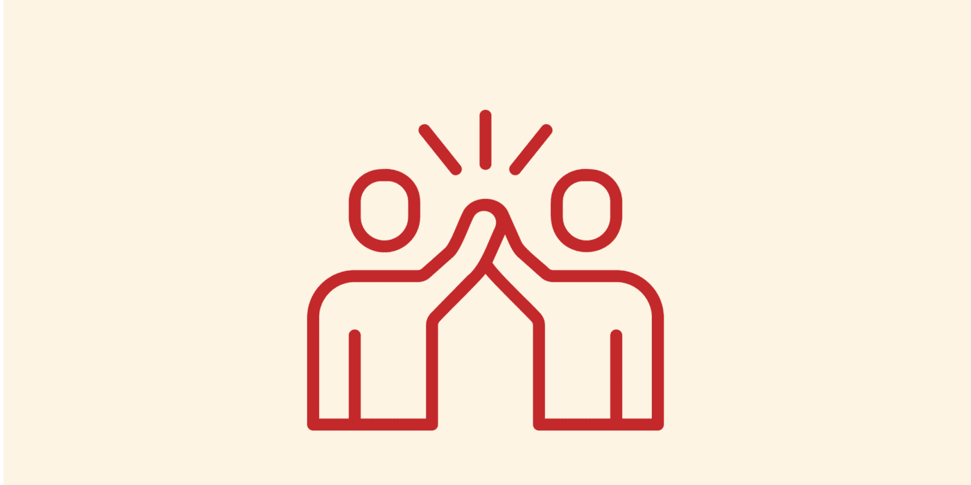 2 people giving high-five icon representing community