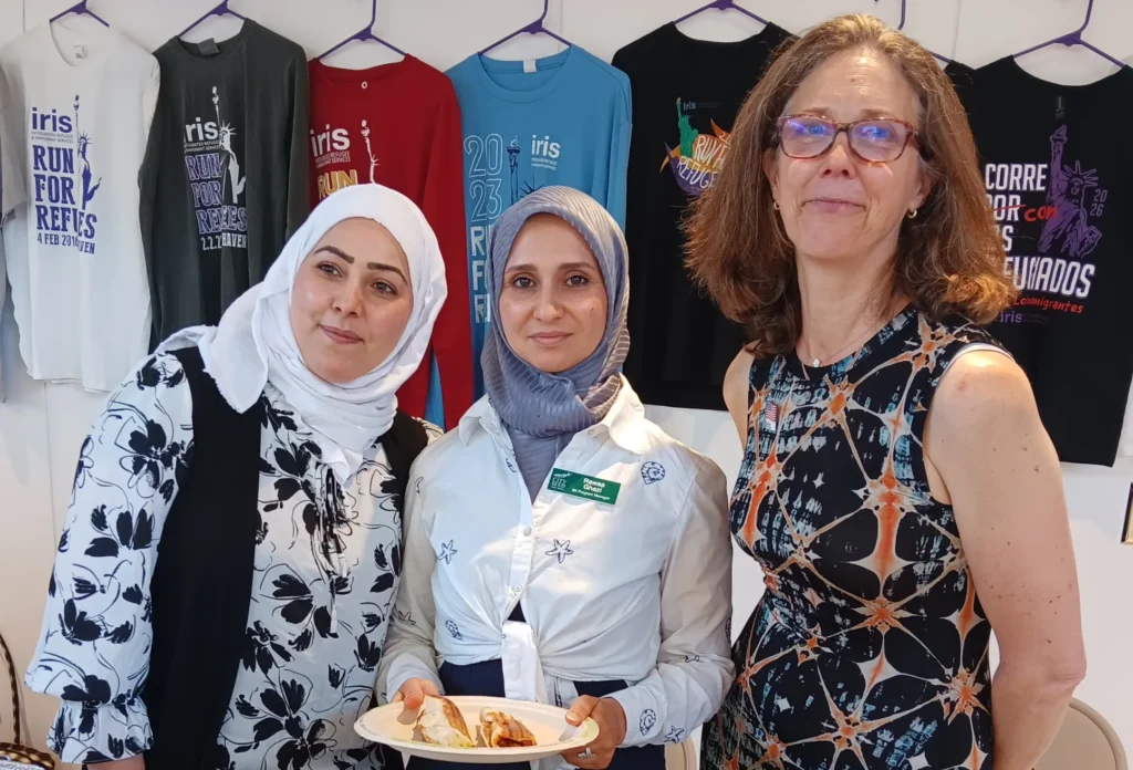 IRIS Executive Director Maggie Mitchell Salem (right), with Sanctuary Kitchen directors Aminah Alsaleh and Rawaa Ghazi.